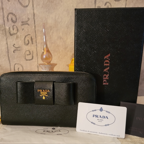 Prada Handbags - Authentic PRADA Saffiano Fiocco Bow Zippy Wallet, Excellent